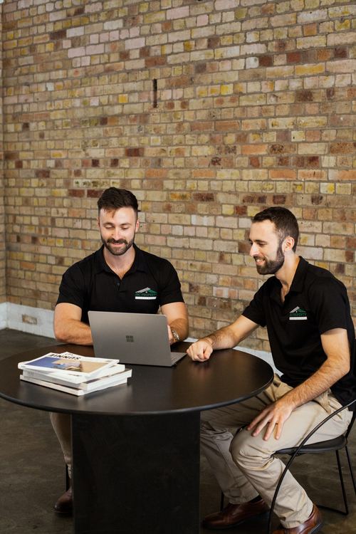 Jacob and Simon working at JSC Property Investments